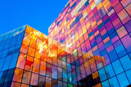 Multi-colored glass wall on office building