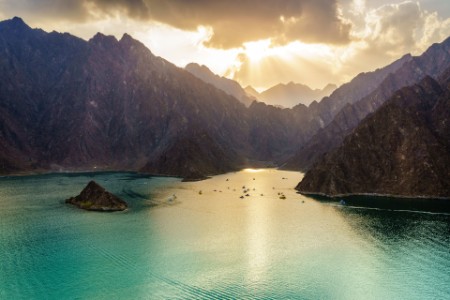 Scenic view of Hatta Lake and Hajar Mountains in the Emirate of Dubai
