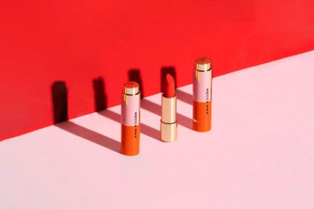Photograph of three Mecca lipsticks