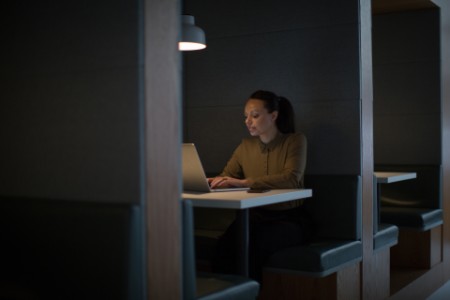 Woman in the office at night