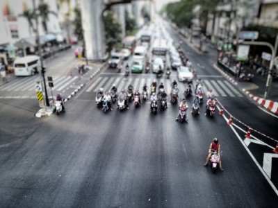 scooters wait traffic lights bangkok