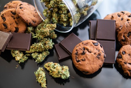 EY - Chocolate and Cookies with cannabis and buds of marijuana