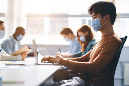 EY - People in workplace with masks on