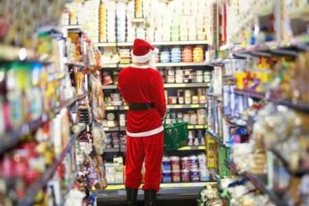 Image of santa standing at shop