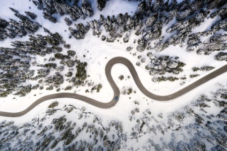 hairpin bends of snowy mountain road
