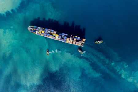 Aerial View of Cargo Ship Mooring in a Harbour