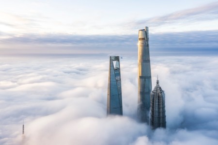 high rise building in the clouds