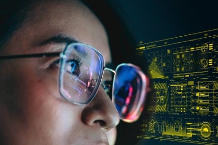 AI reflection of a graph in woman's glasses