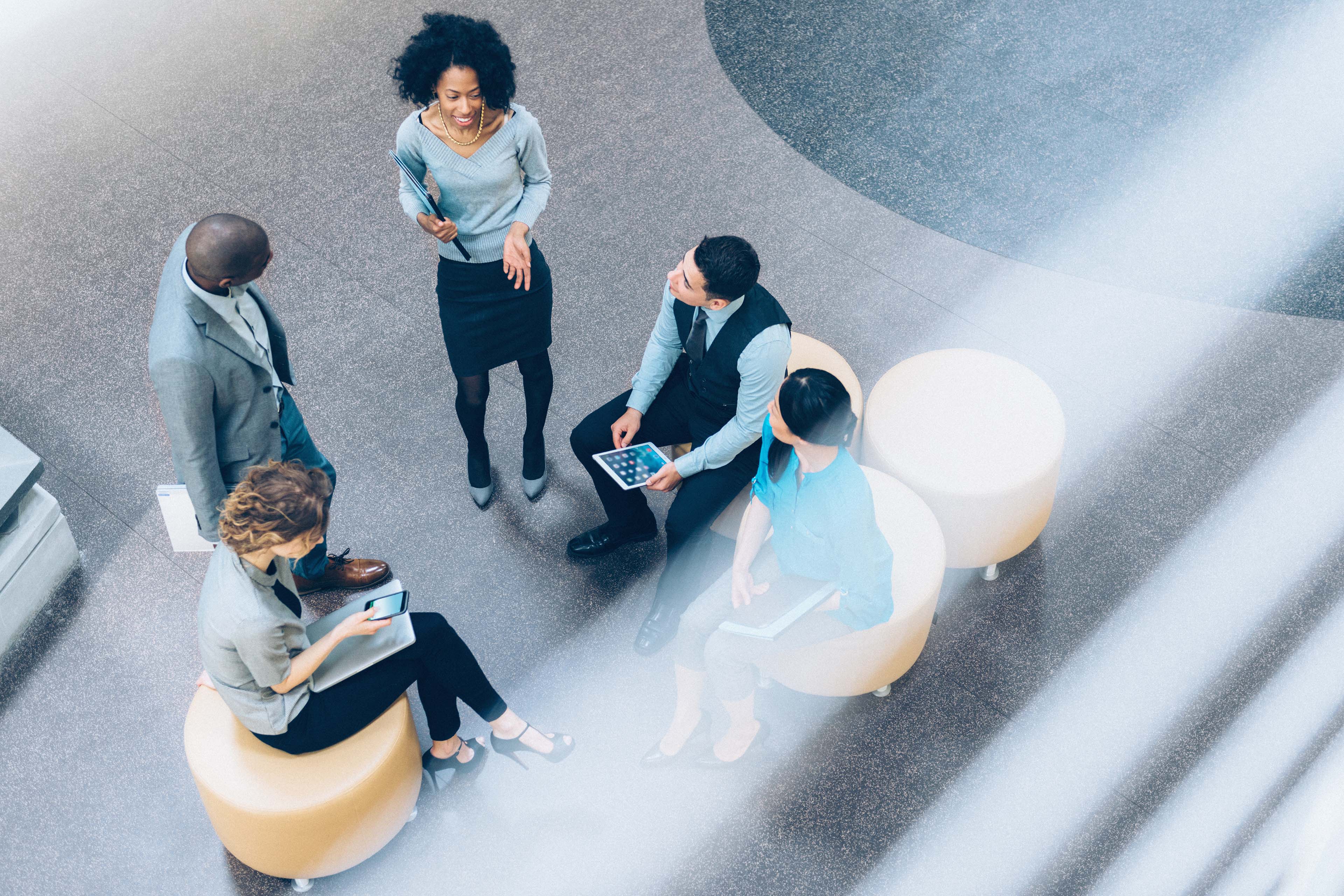 Overhead view of multiracial business team having a meeting in the Office Lobby