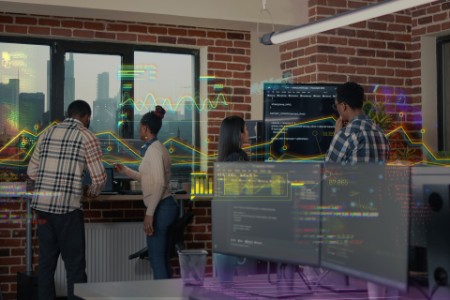 ai system developers analyzing code on wall screen tv looking for errors