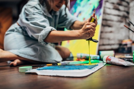 creative woman painting in her studio