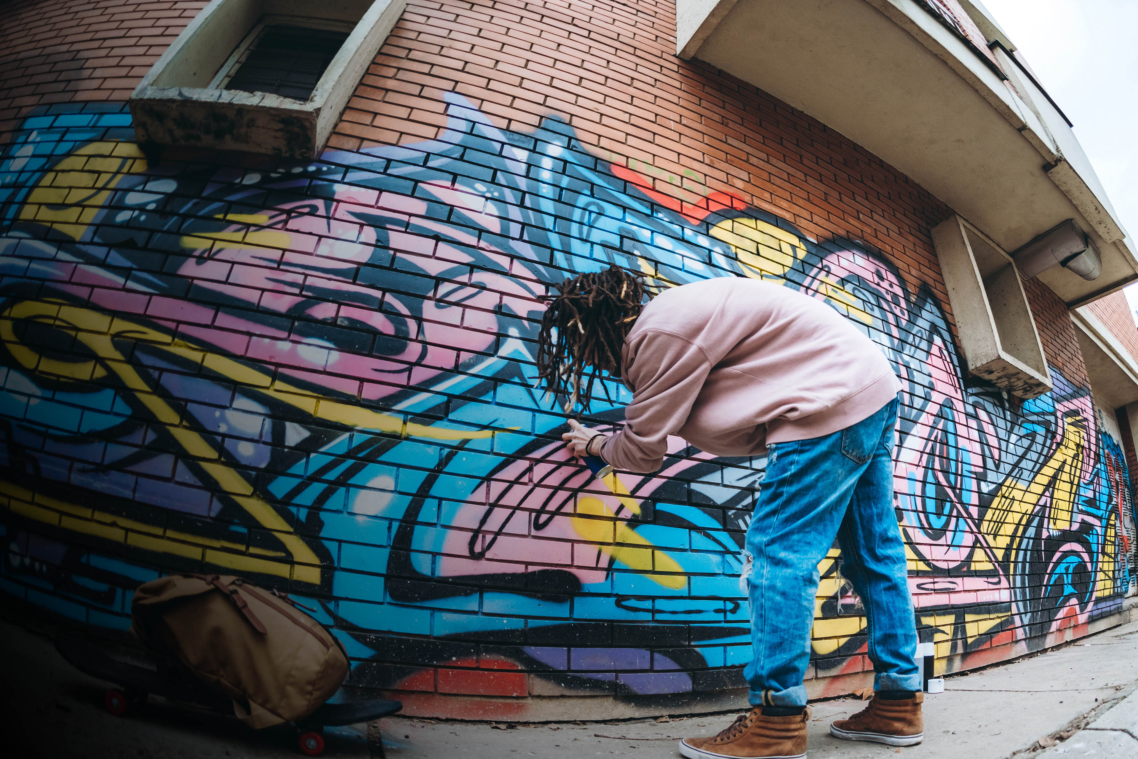 Street artist with dreadlocks