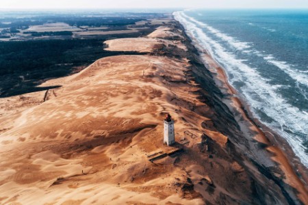 High angle view of lighthouse on hill by sea Denmark