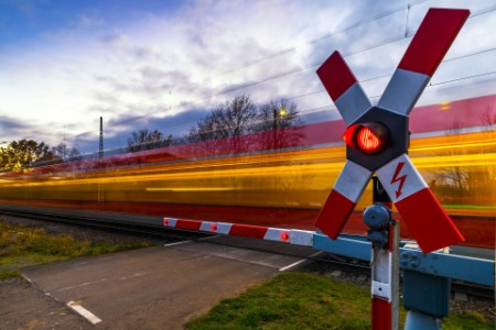 Rail crossing with fast train