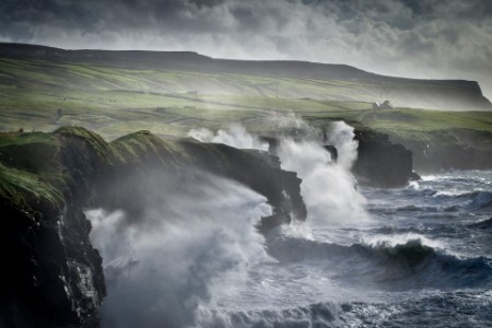 Waves crashing against the Cliffs of Moher, Doolin, Clare, Ireland