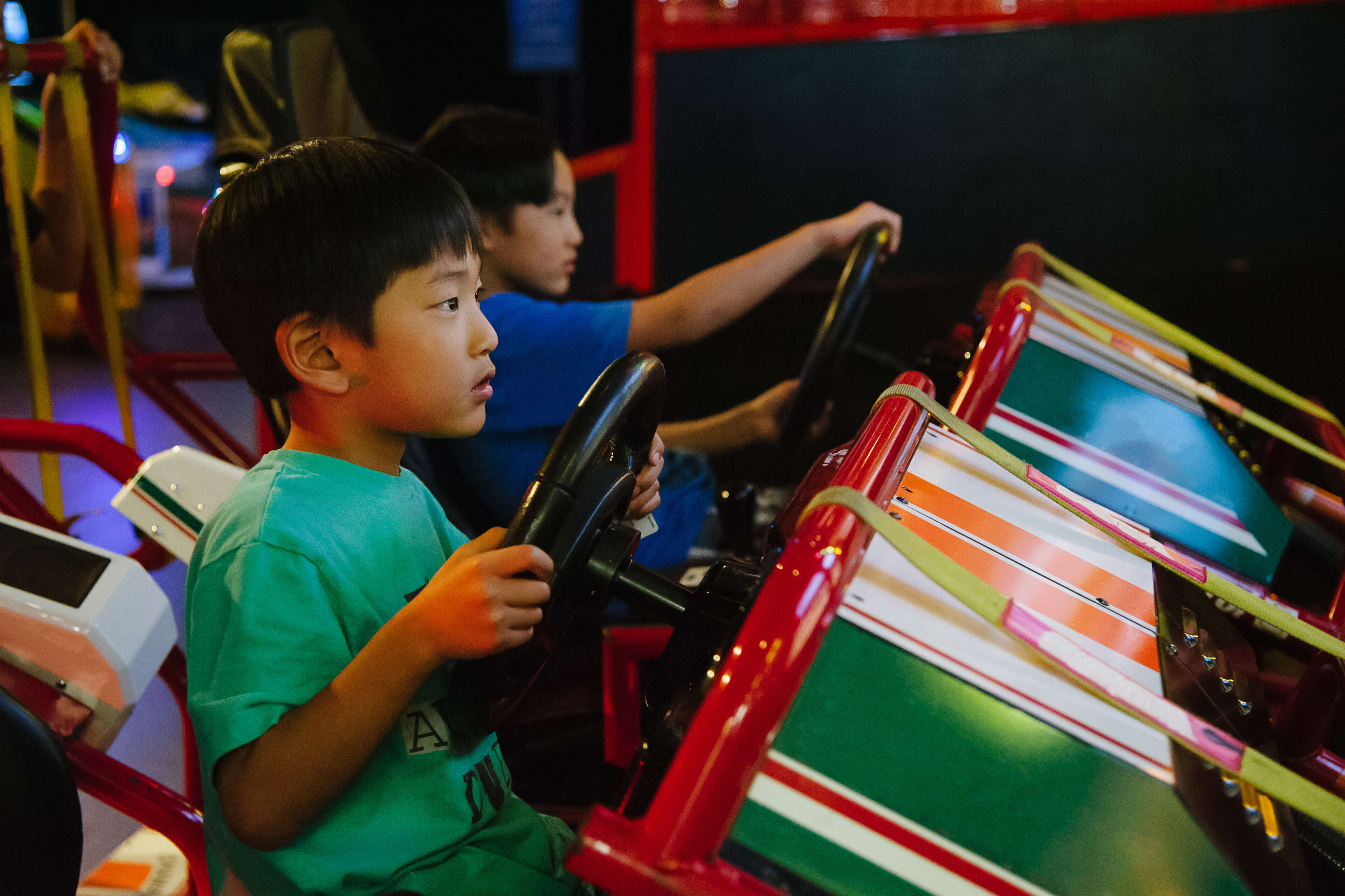 Children gaming in an arcade