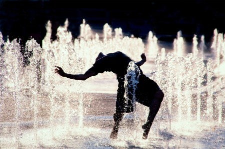 person leans backward bend fountain