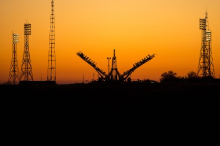 Soyuz launch pad silhouetted in sunrise