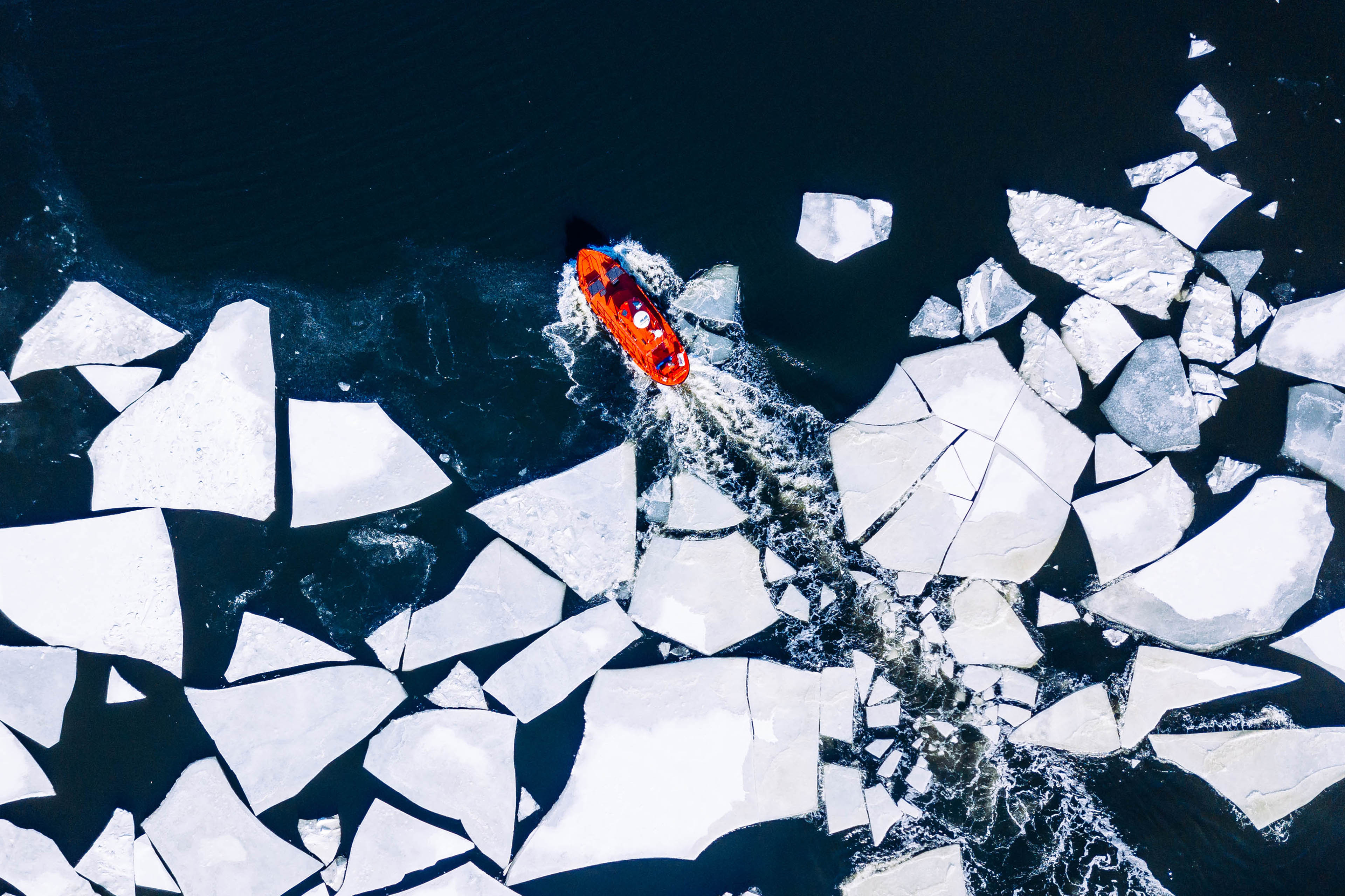 Aerial red ice-breaker cracked ice Baltic Sea Helsinki