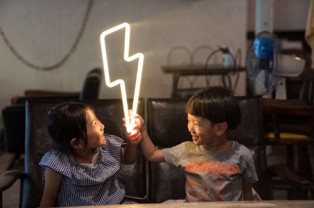 children future consumers workshop holding lightning bolt