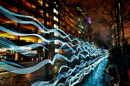 Illuminated light trails in city at night