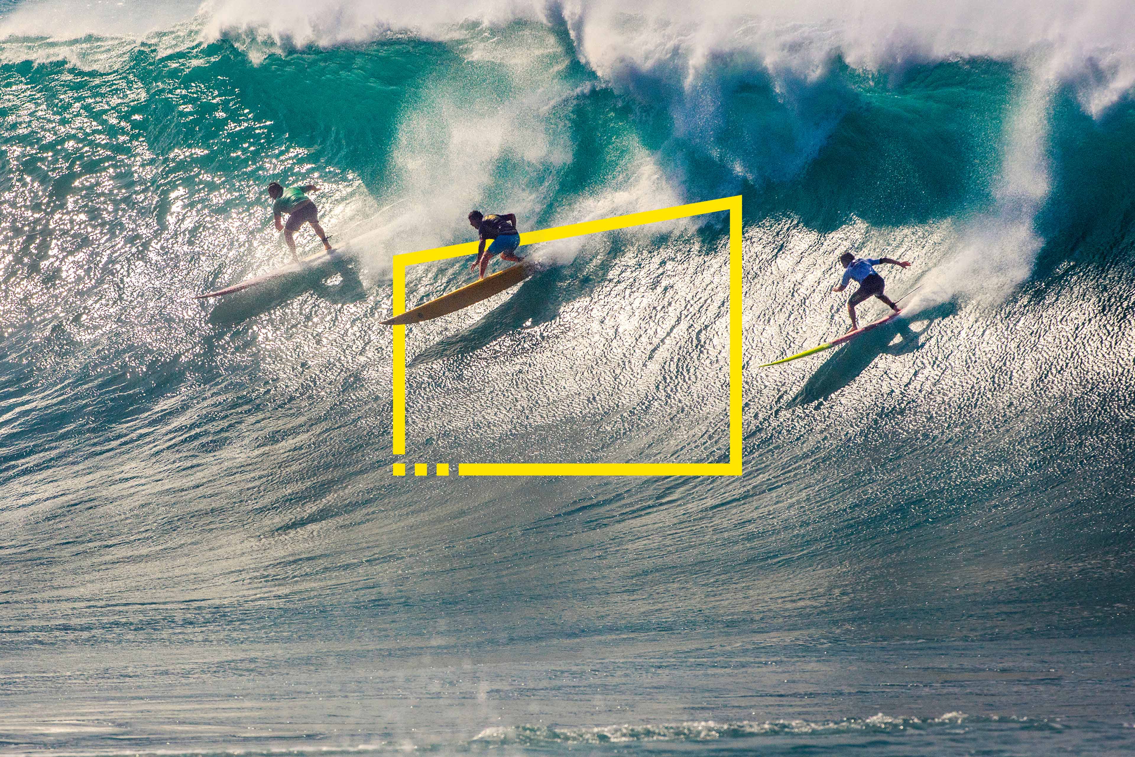 Surfers competing big wave surf competition Waimea Bay  