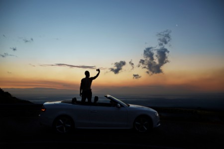 Man photographing sunset