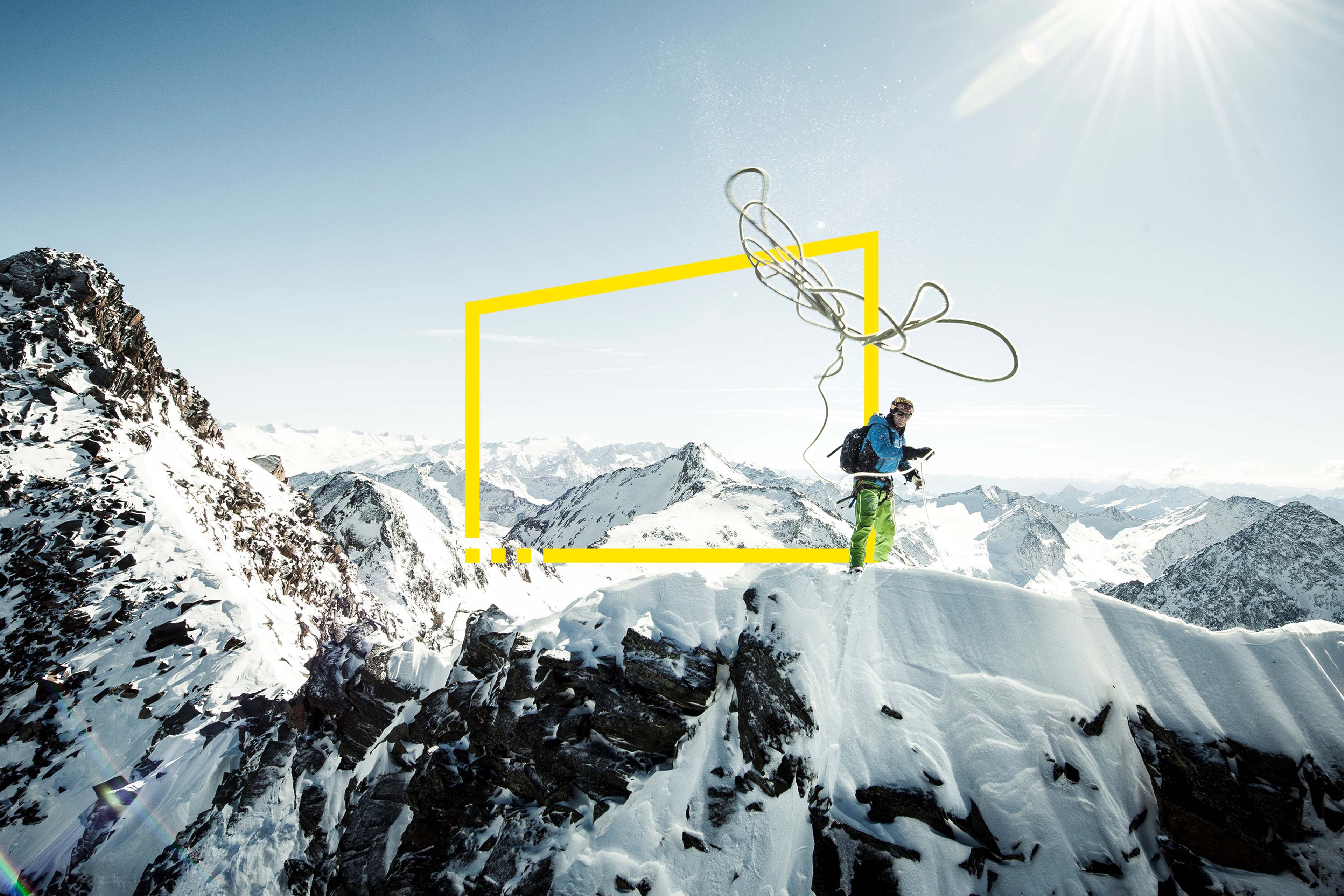 Climber-throwing-his-rope-to-assist-his-climbing-partner-in-the-austrian-alps