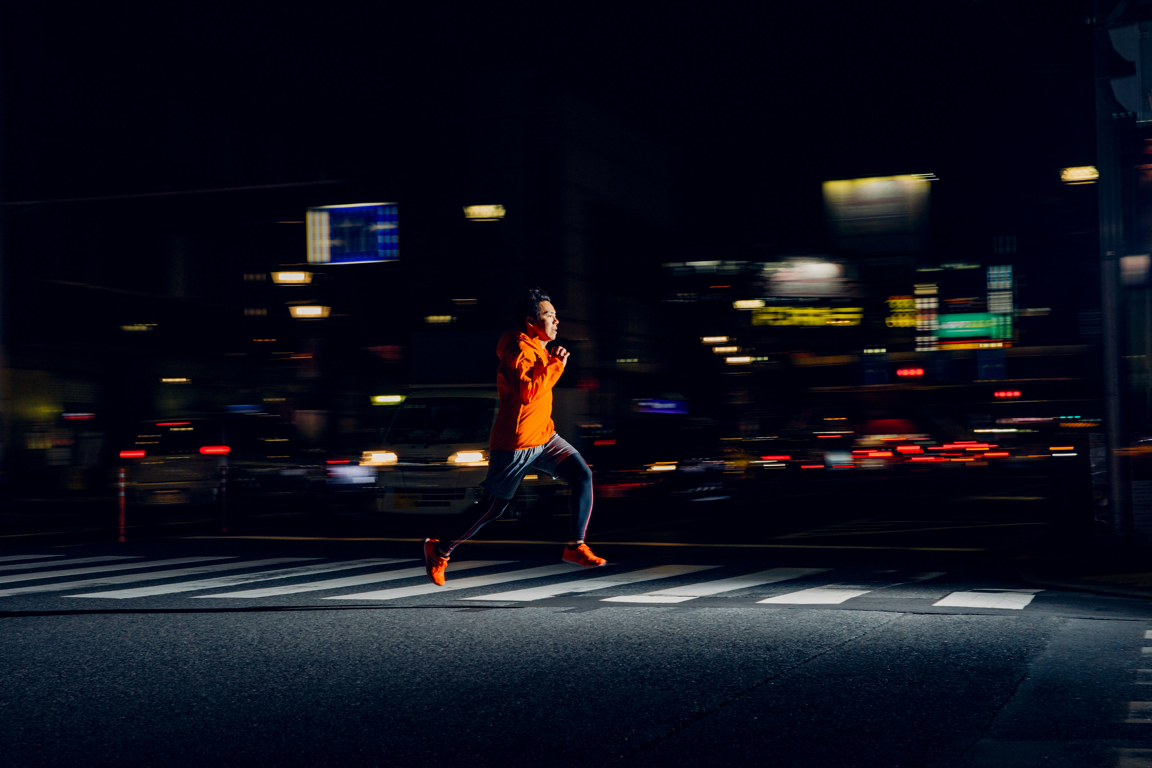 Japanese runner runs through the streets of Tokyo