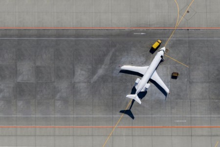 Aerial view of an airplane on the runway