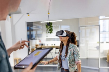 Girl using VR and smiling