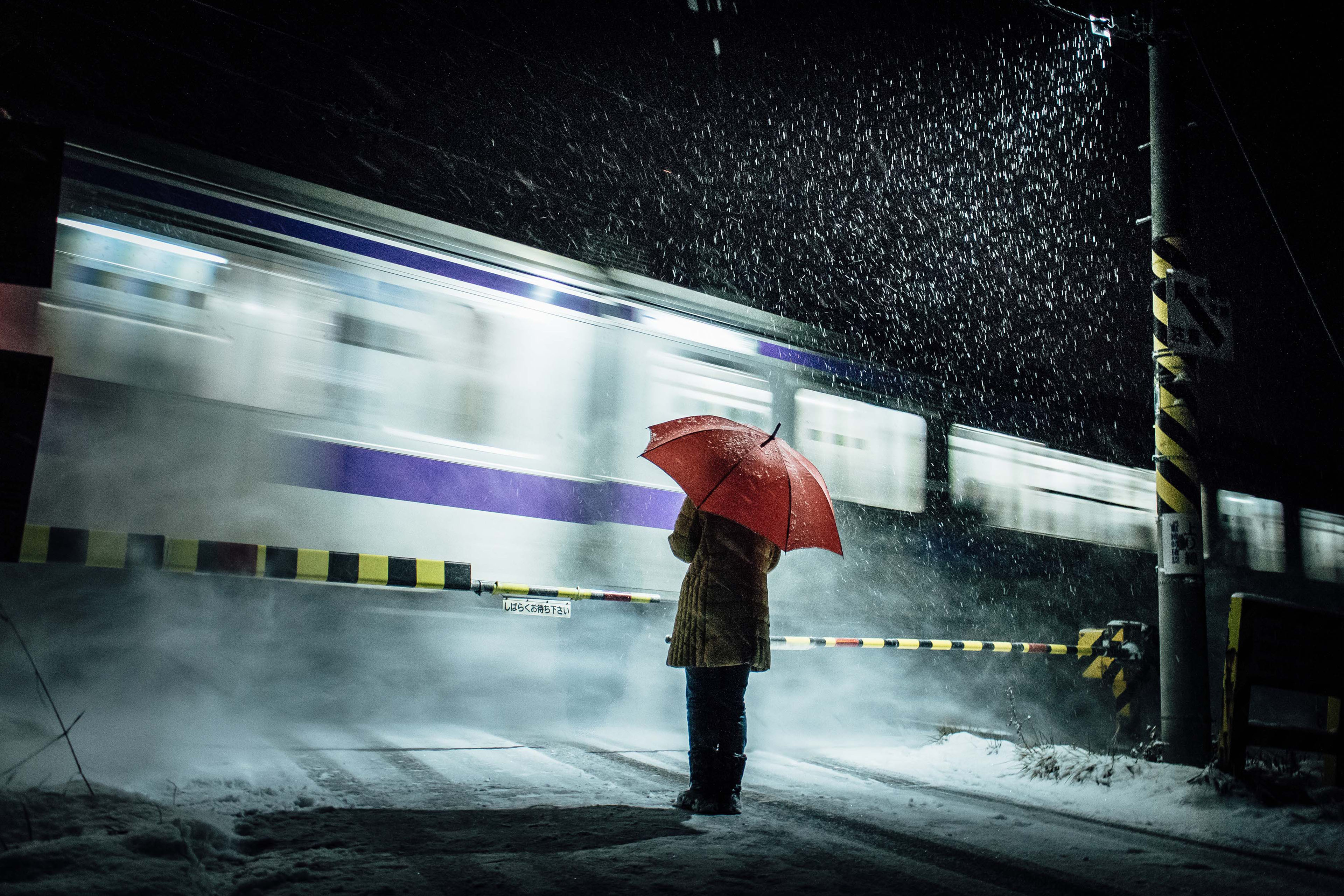 ey-snow-train-level-crossing
