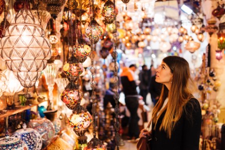 Woman looking lights market Istanbul, Turkey