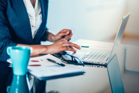 businesswoman on laptop working in the office