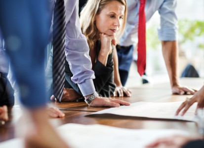 Concentrated Mature Businesswoman During Meeting