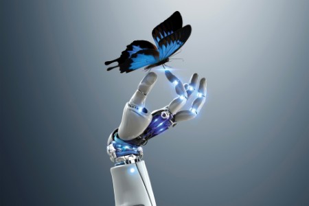 Robot hand holding butterfly