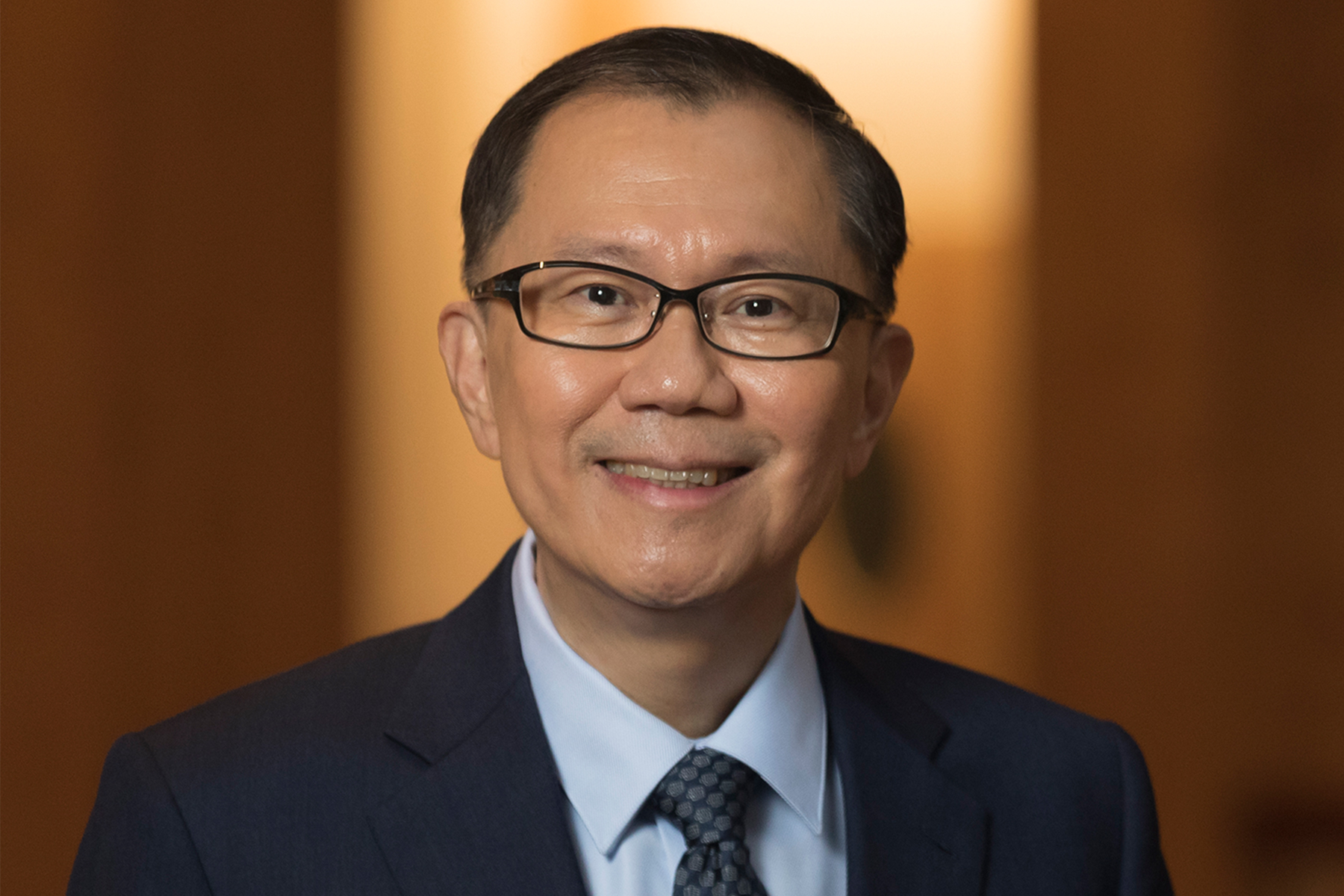 A photographic portrait of Prof. Ho Teck-Hua