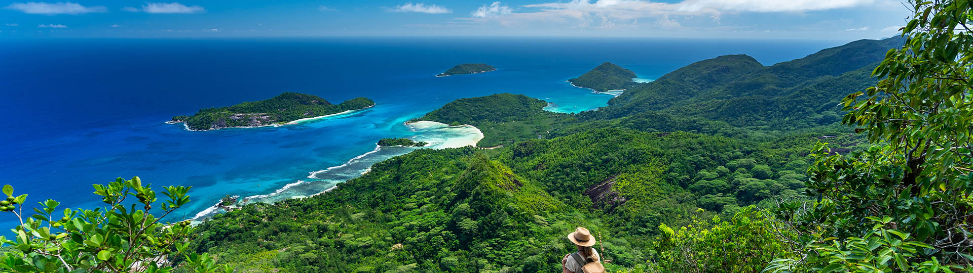 solo traveller high up on tropical island mountain