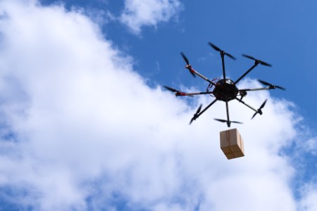 Drone delivering package