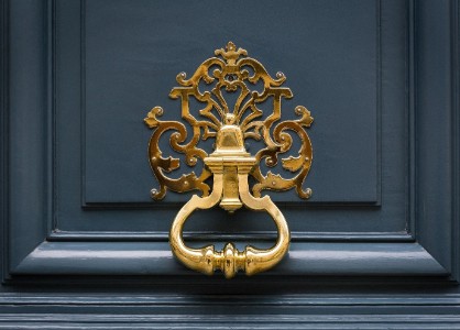 EY golden door knocker
