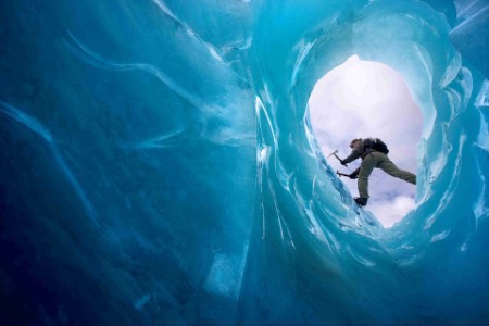 Man climbing a glacier