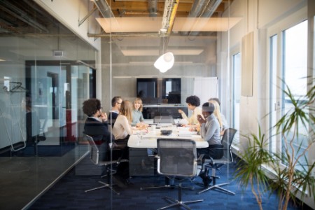 People having a team meeting in a modern office