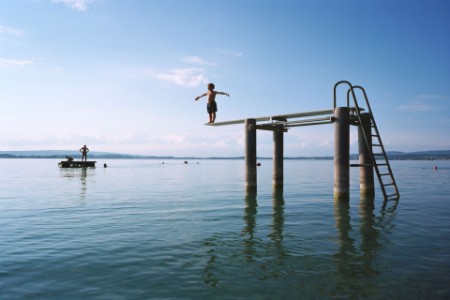 Child diving off a diving board