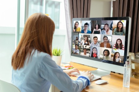 Business people working remotely via video conference