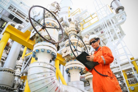 operator recording operation of oil and gas process