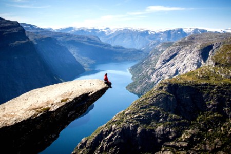 Man sitting on cliff