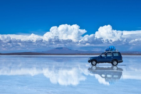 Reflection of car in Salar de Uyuni