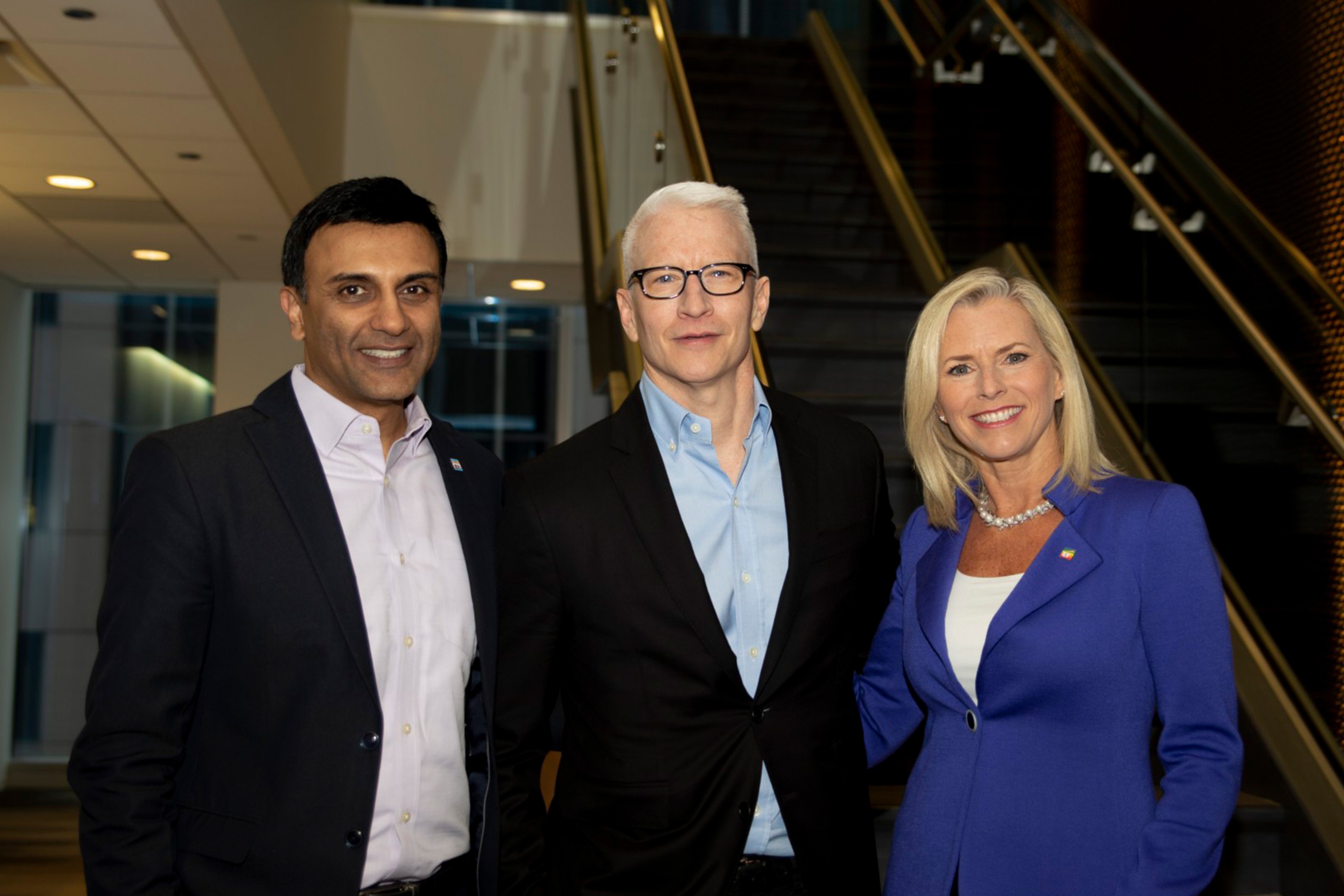 Hiren Shukla, Anderson Cooper and Kelly Grier at the filming of the news program “60 minutes.”