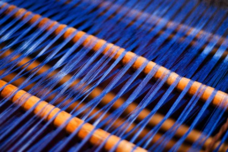 Blue thread in loom