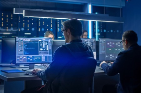 IT Programers Working in Data Center Control Room